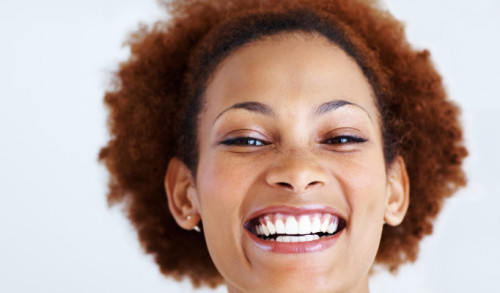 Closeup of a beautiful young African American woman smiling